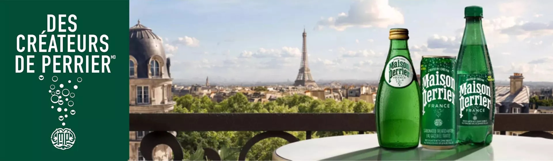 Unflavoured bottles on the table in front of the Paris view